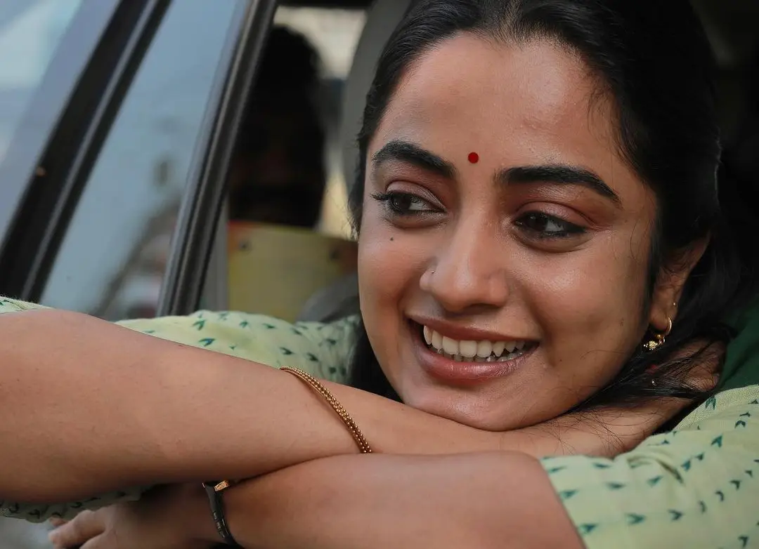 NAMITHA PRAMOD SMILING FACE PHOTOS